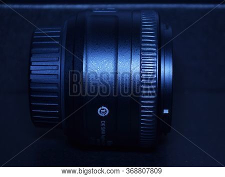 Delhi - India
30th May 2020
Side Angle View Of Dslr Prime Lens 35mm In Blue Background. A Prime Lens