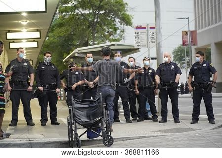 May 29, 2020 - Houston, Texas, USA: Police and spectators collide in downtown Houston, TX as rioters protest the beating and killing of George Floyd by Minneapolis police earlier in the week.