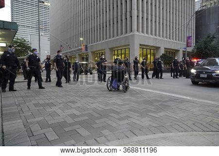 May 29, 2020 - Houston, Texas, USA: Police and spectators collide in downtown Houston, TX as rioters protest the beating and killing of George Floyd by Minneapolis police earlier in the week.