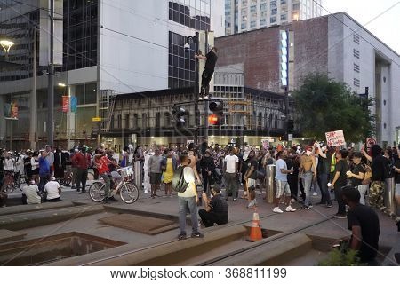 May 29, 2020 - Houston, Texas, USA: Police and spectators collide in downtown Houston, TX as rioters protest the beating and killing of George Floyd by Minneapolis police earlier in the week.