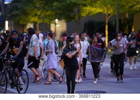 May 29, 2020 - Houston, Texas, USA: Police and spectators collide in downtown Houston, TX as rioters protest the beating and killing of George Floyd by Minneapolis police earlier in the week.
