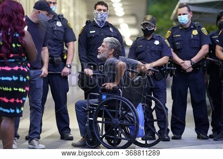May 29, 2020 - Houston, Texas, USA: Police and spectators collide in downtown Houston, TX as rioters protest the beating and killing of George Floyd by Minneapolis police earlier in the week.