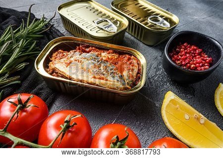 Tin Can Of Mackerel, Scombridae Opened And Closed Cans No Label, With Organic Vegetables Herbs And L