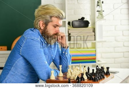 Thinking About Next Step. Chess Lesson. Strategy Concept. Playing Chess. Intellectual Hobby. Develop