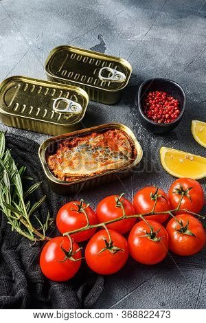 Tin Can Of Mackerel, Scombridae Opened And Closed Cans No Label, With Organic Vegetables Herbs And L