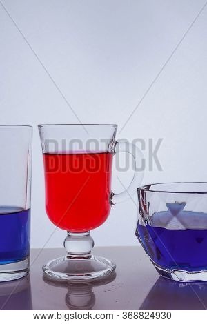 Colored Silhouette Of A Beer Bottle With A Cork On A Black White Background