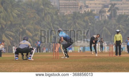 Mumbai, India - 5 December 2018: People Playing Cricket In The Central Park At Mumbai, Slow Motion V