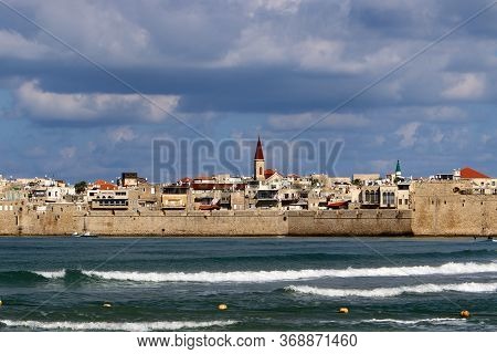 Fortress Walls Of The Old City Of Acre. Acre - One Of The Oldest Cities In Northern Israel On The Sh