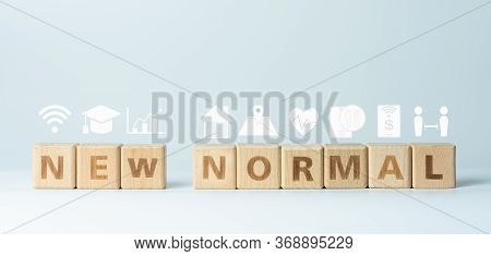 Word Wood Block New Normal. Lifestyle Concept After Coronavirus Or Covid-19. Internet Usage, E-learn