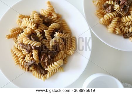 On Table Is Plate Cooked Delicious Pasta And Meat. Changing Eating Habits On Self-isolation. Cook Si
