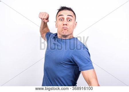 Man Looking Violently Forward About To Punch Him. On White Background Middle Plane