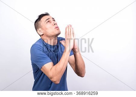Man Praying. White Back Ground, Medium Shot