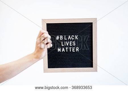 Hands Holding A Felt Letter-board With Word Black Lives Matter And I Cantt Breathe