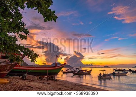 Beautiful Sunrise Above Fishing Boats On Rawai Beach, Phuket,thailand.