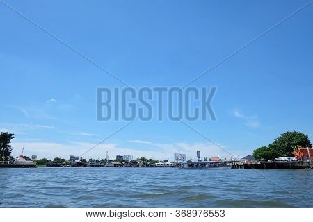 River Waves Against Blue Sky White Fluffy Clouds In Evening At Koh-kret,nonthaburi,thailand