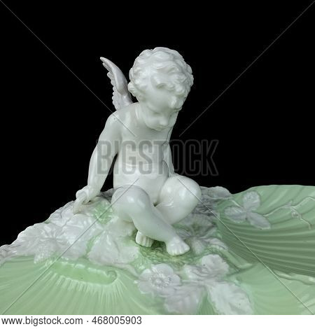 Beautiful Vase With A Flower Pattern On A Black Isolated Background. Antique Porcelain Vase With Pai