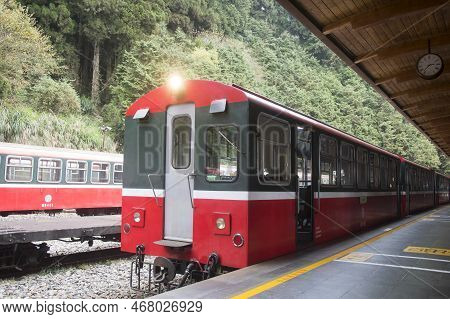 Alishan, Taiwan- 7 Dec, 2022: Red Train Stop At Alishan Station In Alishan National Scenic Area Taiw