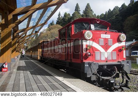 Alishan, Taiwan- 7 Dec, 2022: Red Train Stop At Alishan Station In Alishan National Scenic Area Taiw