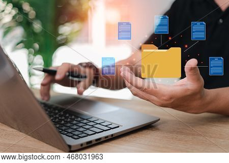Businessman With Document Management System (dms), Online Document Database, And Automated Processes