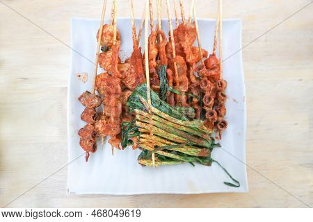 Barbecued Pork Or Grilled Pork , Grilled Chitterlings Or Fried Chitterlings Or Chinese Food