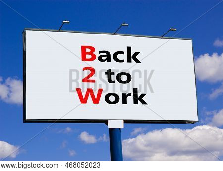 B2w Back To Work Symbol. Concept Words B2w Back To Work On White Big Billboard On A Beautiful Blue S