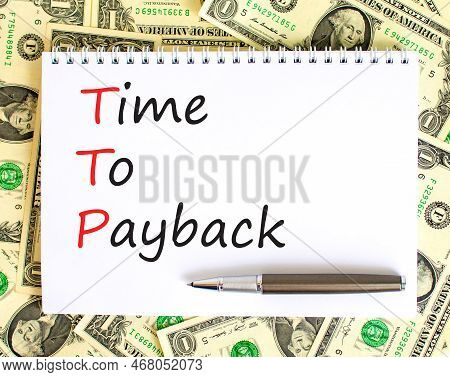 Ttp Time To Payback Symbol. Concept Words Ttp Time To Payback On White Note On A Beautiful Backgroun