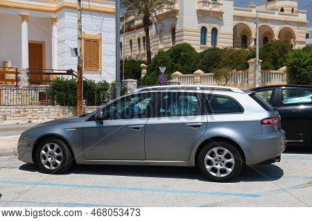 Salento, Italy - June 2, 2017: Alfa Romeo 159 Compact Executive Station Wagon Car Parked In Italy. T