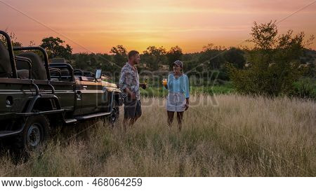 Asian Women And European Men On Safari Game Drive In South Africa Kruger National Park
