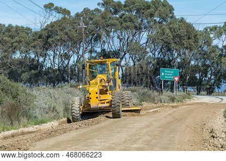 Struisbaai, South Africa - Sep 22, 2022: A Road Grader Working On The Road Between Arniston And Stru