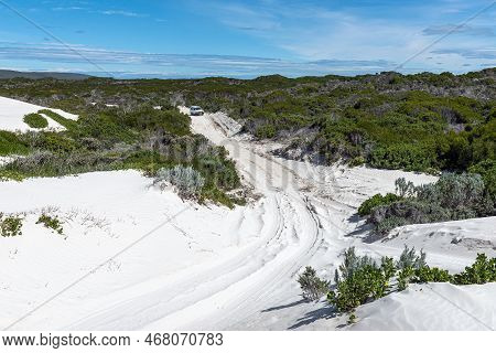 Struisbaai, South Africa - Sep 22, 2022: A Vehicle Is Visible On The Road To The Struisbaai Plaat, O