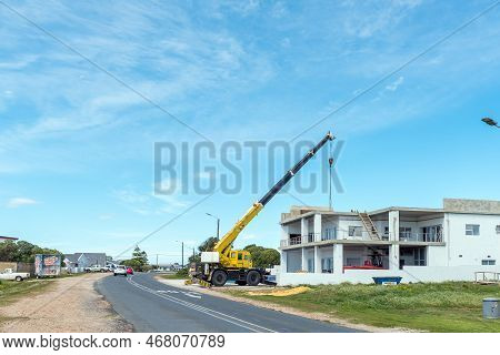 Struisbaai, South Africa - Sep 22, 2022: A Street Scene, With Bulding Construction In Progress, In S