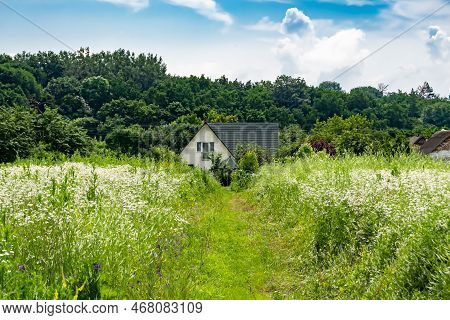 Beautiful Old Abandoned Building Farm House In Countryside On Natural Background