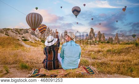 Cappadocia Turkey During Sunrise, Couple On Vacation In The Hills Of Goreme Capadocia Turkey