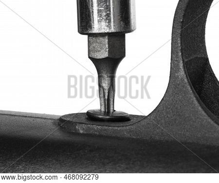 Triggerguard Being Removed By A Star Headed Screwdriver On A Rifle