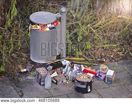 New Year's Garbage. Fireworks Batterys Next To A Trash The Footpath After The Traditional New Years 