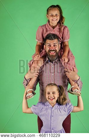 Having Fun. Happy Family Concept. Bearded Father With Two Small Girls. Kids Love Their Dad. Children