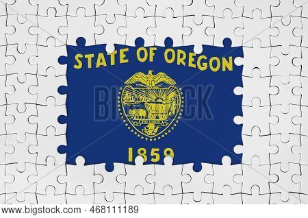 Oregon Us State Flag In Frame Of White Puzzle Pieces With Missing Central Parts