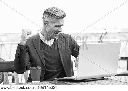 Got The Job Done In Time. Happy Man Check Watch And Laptop. Punctuality. Manager Make Winning Geture