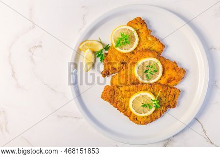 Breaded Fish, Baked And Served With Lemon. Common Dab, Edible Flatfisch (limanda Limanda)