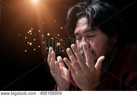 Hands Folded In Prayer On In Church Concept For Faith, Spirituality And Religion, Man Praying In The