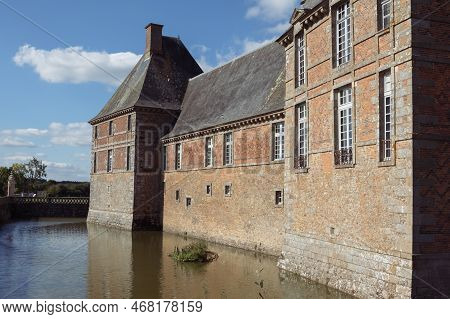 The Ancient Building Of The Chateau In France Around The Lake Building, The Building Close-up Has A 