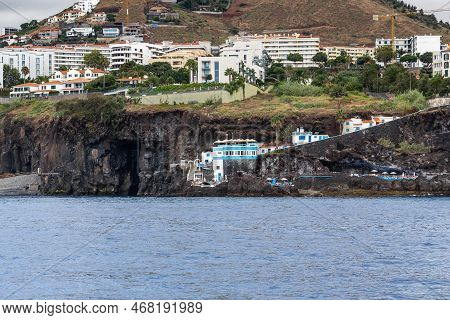 Funchal, Portugal - August 25, 2021: This Is A View From The Ocean To The Coastal Spa Complex Da Doc