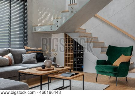 Stylish Composition Of Living Room Interior With Corner Grey Sofa, Green Velvet Armchair, Coffee Tab