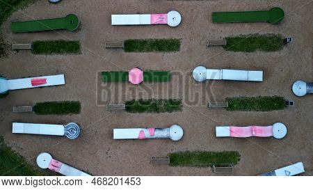 Minigolf Course In Park Catch Golf Balls Behind Obstacle. Game For Points Below Par Or Above Par, Re