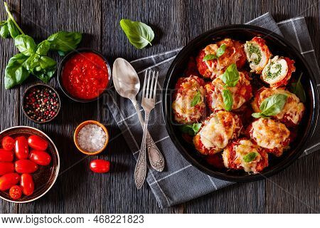 Chicken Rollatini With Spinach Ricotta Filling In Marinara Sauce Topped With Mozzarella Cheese And F