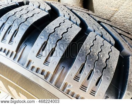 Close-up Of New Touring Winter Tyre Mounted On A New Rhim Wheel