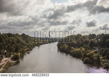 Autumn Scenery With Colorful Trees Reflected In The Water. Pedestrian Bridge Across Teteriv River, Z