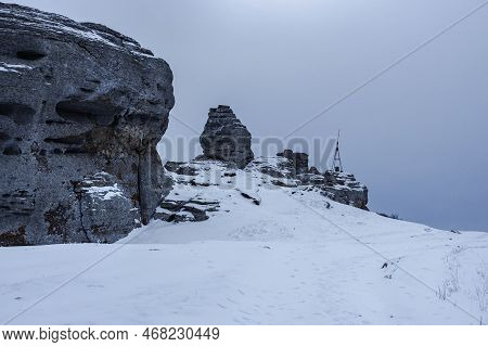 Rocks On The Top Of Mount Alenga. Southern Demerdzhi In Snow And Ice Early Spring. Crimea