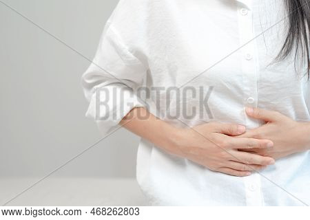 Stomach Ache. Asian Women Have Abdominal Pain, Indigestion, Gastritis, Menstrual Cramps, Flatulence,