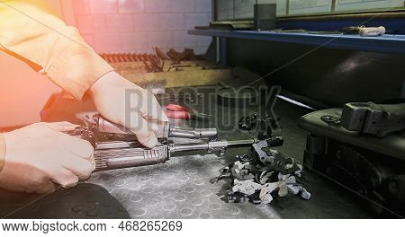 Repair Of Small Arms In A Special Workshop. Details In The Hands Of A Master Gunsmith. Kalashnikov M